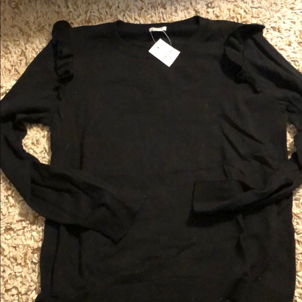 J crew black sweater with shoulder detail.